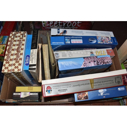 894 - THREE BOXES OF VINTAGE JIGSAW PUZZLES, to include approximately thirty boxed jigsaw puzzles, mostly ... 