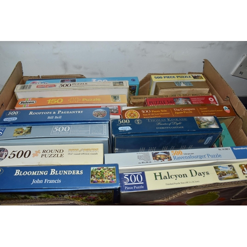 894 - THREE BOXES OF VINTAGE JIGSAW PUZZLES, to include approximately thirty boxed jigsaw puzzles, mostly ... 