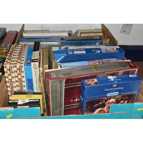 894 - THREE BOXES OF VINTAGE JIGSAW PUZZLES, to include approximately thirty boxed jigsaw puzzles, mostly ... 