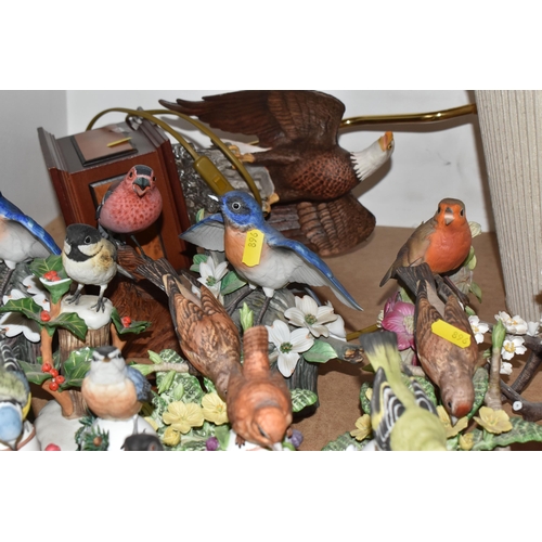 896 - A COLLECTION OF APPROXIMATELY TWENTY-FIVE VINTAGE BIRD ORNAMENTS mostly produced in collaboration wi... 