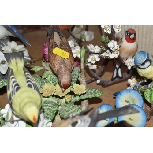 896 - A COLLECTION OF APPROXIMATELY TWENTY-FIVE VINTAGE BIRD ORNAMENTS mostly produced in collaboration wi... 