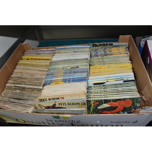 923 - FIVE BOXES AND LOOSE CIGARETTE CARDS, to include a quantity of loose cards, part sets and others in ... 