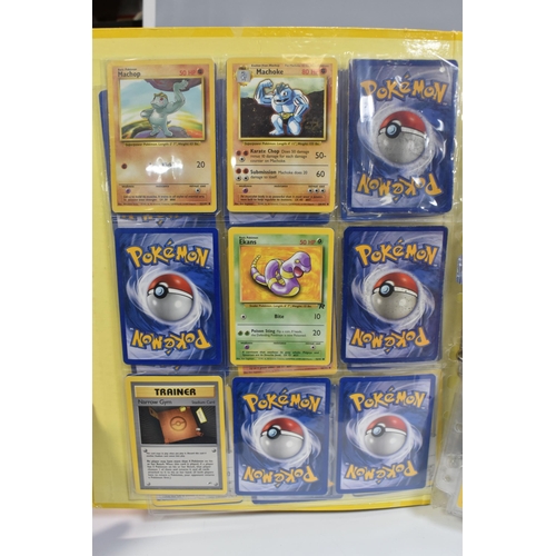 931 - A FOLDER OF POKEMON CARDS, includes cards from the Base Set, Base Set 2, Jungle, Fossil, Team Rocket... 