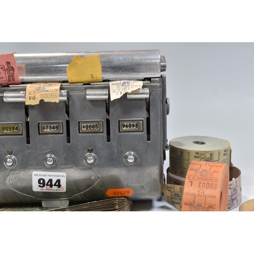 944 - A BUS CONDUCTOR'S TICKET MACHINE loaded with four ticket rolls, four loose rolls for Newport and Bla... 