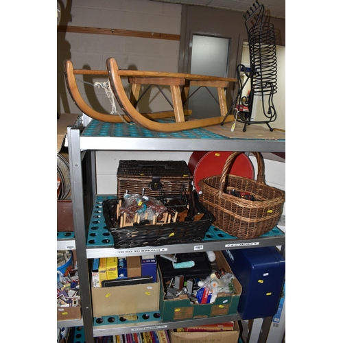 920 - TWO BOXES AND LOOSE SLEDGE, TOOLS AND SUNDRY ITEMS, to include a wooden sledge, a CD rack in the for... 