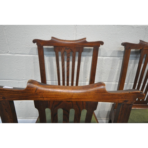 157 - A SET OF SIX GEORGIAN OAK DINING CHAIRS, with shaped crest, central splat back, green upholstered se... 