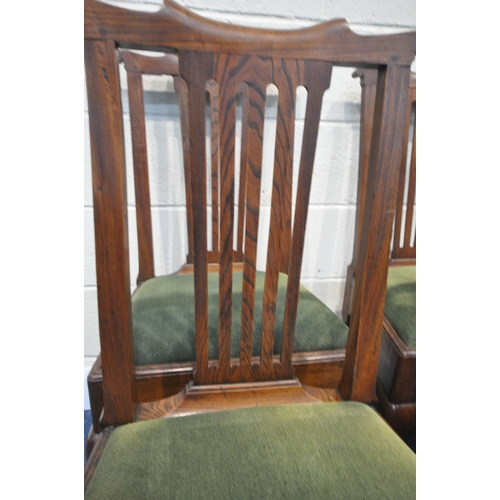 157 - A SET OF SIX GEORGIAN OAK DINING CHAIRS, with shaped crest, central splat back, green upholstered se... 