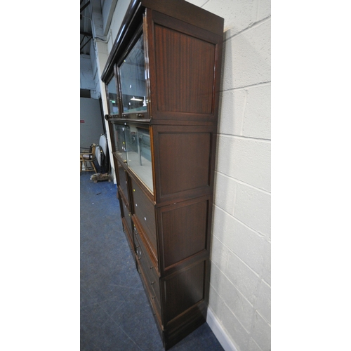 160 - A 20TH CENTURY MAHOGANY SECTIONAL CABINET, fitted with double bevelled glass hide and fall doors, do... 