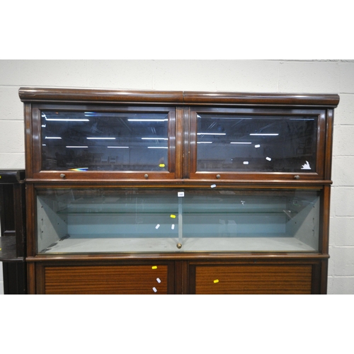 160 - A 20TH CENTURY MAHOGANY SECTIONAL CABINET, fitted with double bevelled glass hide and fall doors, do... 