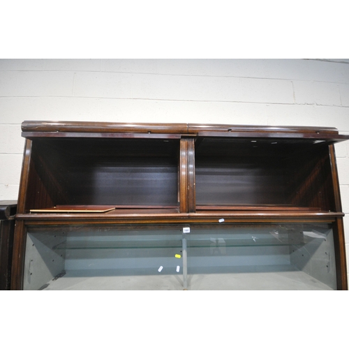 160 - A 20TH CENTURY MAHOGANY SECTIONAL CABINET, fitted with double bevelled glass hide and fall doors, do... 