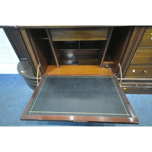 160 - A 20TH CENTURY MAHOGANY SECTIONAL CABINET, fitted with double bevelled glass hide and fall doors, do... 