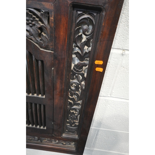 172 - A 20TH CENTURY HARDWOOD SHUTTER MIRROR, with foliate carved details, and double slatted doors, 81cm ... 