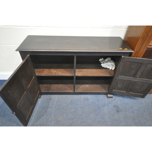 177 - A 20TH CENTURY OAK BOOKCASE, with double glazed doors, over smaller cupboard doors, width 92cm x dep... 