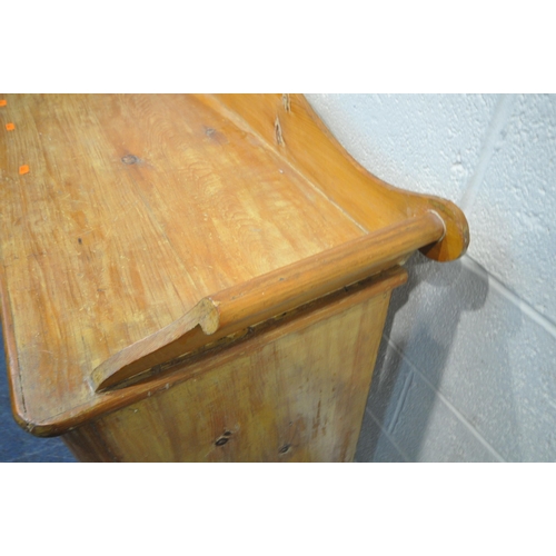 179 - A 19TH CENTURY PINE WASHSTAND, with raised back and sides, fitted with two short over two long drawe... 