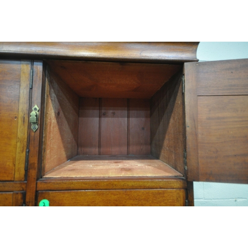 187 - AN EARLY 20TH CENTURY MAHOGANY LOCKER CABINET, fitted with ten cupboard doors, width 100cm x depth 5... 