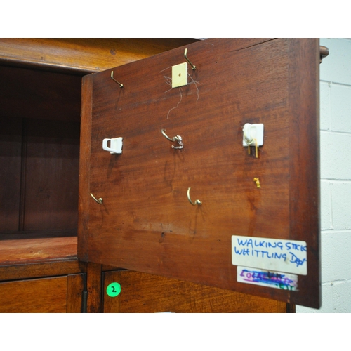 187 - AN EARLY 20TH CENTURY MAHOGANY LOCKER CABINET, fitted with ten cupboard doors, width 100cm x depth 5... 