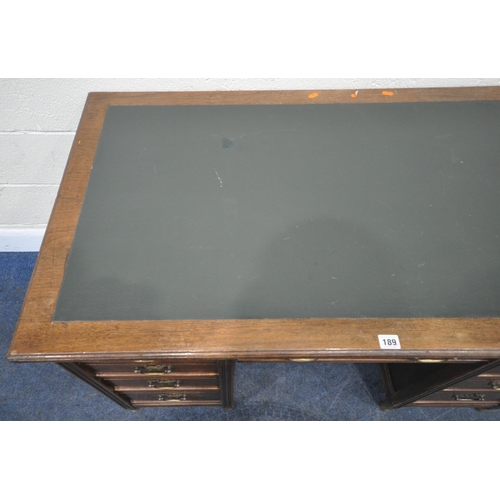 189 - A 20TH CENTURY WALNUT KNEEHOLE DESK, with a green writing surface, fitted with nine assorted drawers... 