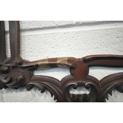 195 - A 19TH CENTURY ROSEWOOD POLE SCREEN, of a fluted form, on a dished base, with three legs, with a lat... 