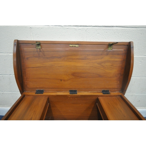 196 - A LATE 20TH CENTURY HARDWOOD BLANKET CHEST, with twin handles, brass banding, the hinged lid enclosi... 