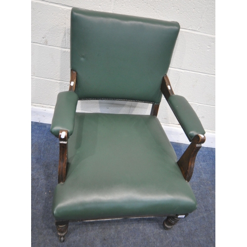 199 - AN EARLY 20TH CENTURY ARMCHAIR, with green leatherette upholstery, raised on turned front legs, widt... 