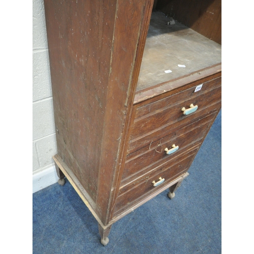 215 - A LATE 19TH/EARLY 20TH CENTURY STAINED PINE CUPBOARD, the missing door encloses one fixed shelf, abo... 