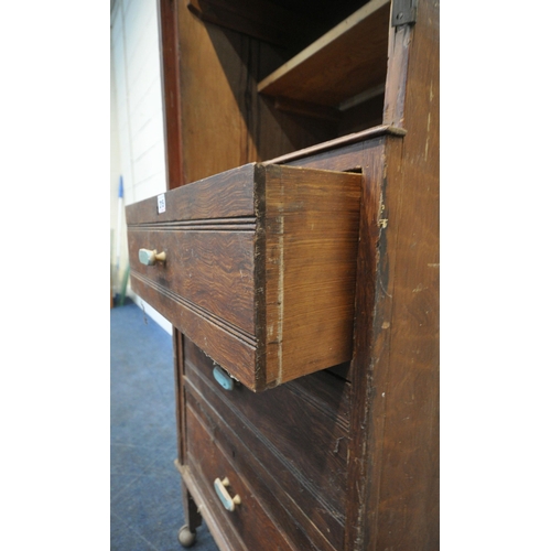 215 - A LATE 19TH/EARLY 20TH CENTURY STAINED PINE CUPBOARD, the missing door encloses one fixed shelf, abo... 