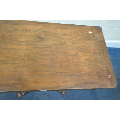 225 - A REGENCY ROSEWOOD TABLE, with a later rotating top, octagonal tapered base, raised on a shaped base... 