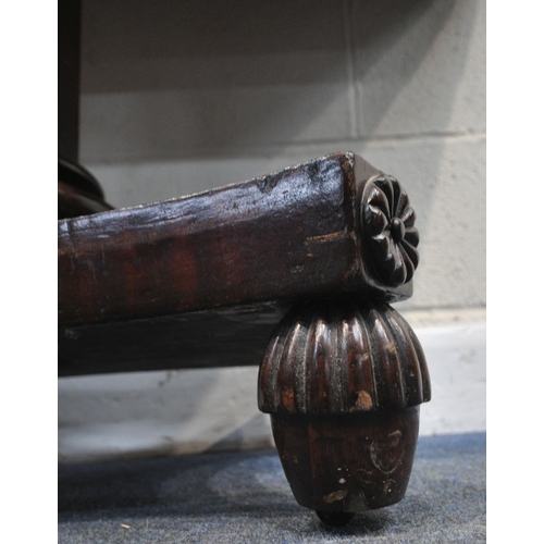 226 - A REGENCY MAHOGANY D END TABLE, raised on an octagonal tapered support, with a shaped base, and acor... 