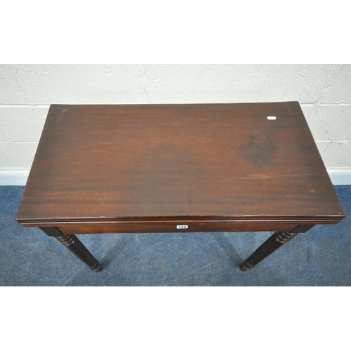 228 - A MAHOGANY FOLD OVER CARD TABLE, the two back legs pull out revealing a storage section, and a table... 