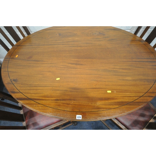 229 - A 20TH CENTURY MAHOGANY OVAL TILT TOP TABLE, raised on a turned support and four legs, width 136cm x... 