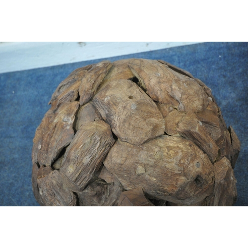 232 - A NEAR PAIR OF TEAK DRIFTWOOD DECORATIVE SPHERES, approximate diameter 41cm, condition report: overa... 