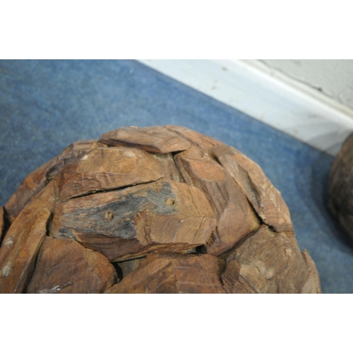 232 - A NEAR PAIR OF TEAK DRIFTWOOD DECORATIVE SPHERES, approximate diameter 41cm, condition report: overa... 