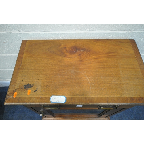 234 - A 20TH CENTURY MAHOGANY PIER CABINET, fitted with a single drawer, over a single glass door, width 7... 