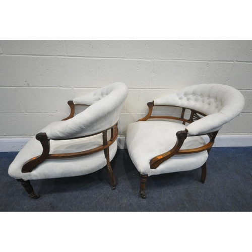 245 - A PAIR OF EARLY VICTORIAN ROSEWOOD TUB CHAIRS, with a curved buttoned back, open armrests, central d... 