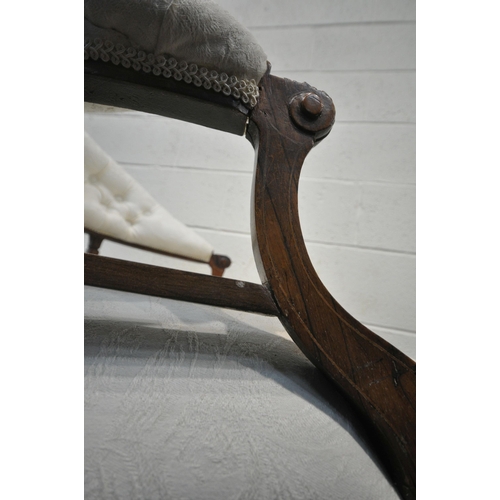 245 - A PAIR OF EARLY VICTORIAN ROSEWOOD TUB CHAIRS, with a curved buttoned back, open armrests, central d... 