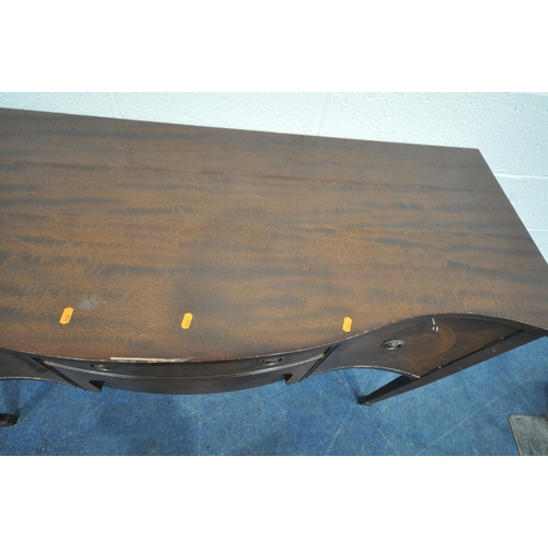 249 - AN 20TH CENTURY MAHOGANY SERPENTINE SIDEBOARD, fitted with two drawers, flanked by double cupboard d... 