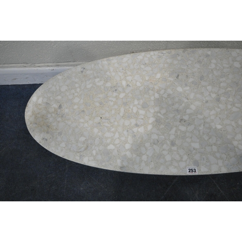 253 - IN THE STYLE OF IGNAZIO GARDELLA, A TERRAZZO OVAL COFFEE TABLE, raised on a tubular metal base, leng... 