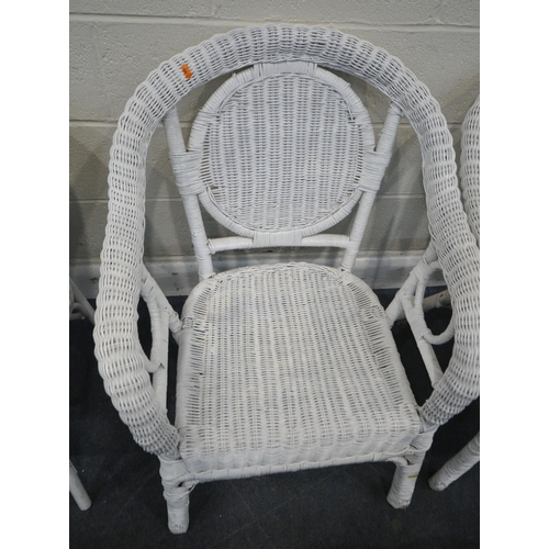 255 - A PAIR OF WHITE PAINTED WICKER ARMCHAIRS, another white painted chair, along with two unpainted tabl... 