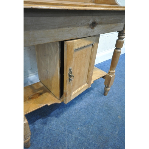 258 - A 19TH CENTURY PINE WASHSTAND, the raised back with tile inserts, a rail to each end, a single cupbo... 