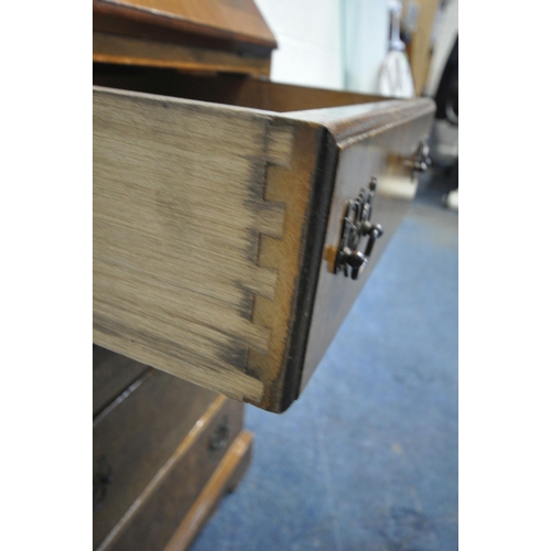 264 - A 20TH CENTURY MAHOGANY AND BURR WALNUT BUREAU, the fall front door enclosing a fitted interior, ove... 