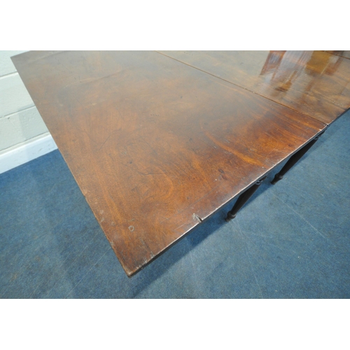 267 - A GEORGIAN MAHOGANY DROP LEAF TABLE, raised on cylindrical turned legs, open width 172cm x closed wi... 