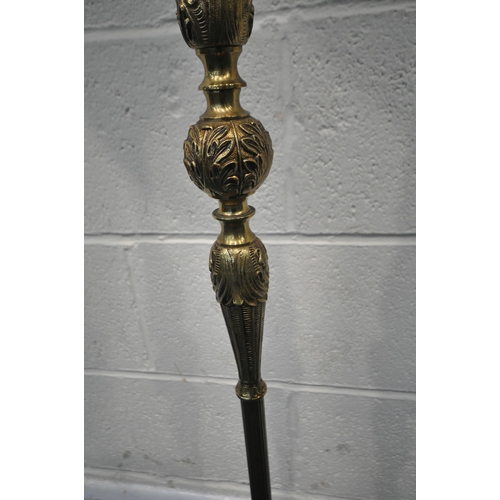 270 - A BRASS STANDARD LAMP, with foliate details, raised on three scrolled legs, height to fitting 138cm,... 