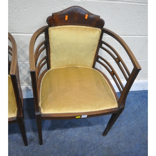 271 - A PAIR OF EDWARDIAN MAHOGANY LADIES AND GENTS ARMCHAIRS, with a scrolled crest, shaped armrests, rai... 