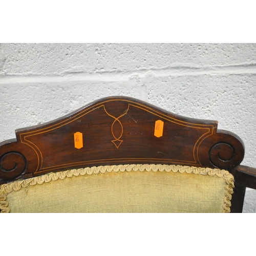 271 - A PAIR OF EDWARDIAN MAHOGANY LADIES AND GENTS ARMCHAIRS, with a scrolled crest, shaped armrests, rai... 