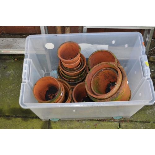 5 - A TRAY CONTAINING TERRACOTTA PLANT POTS, twenty four in total of varying sizes along with two step l... 