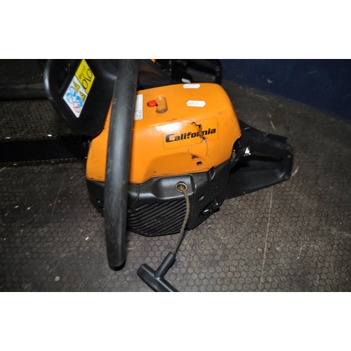 53 - A PARTNER HG55-12 PETROL GARDEN BLOWER and a California petrol chain saw (both engines pull freely b... 