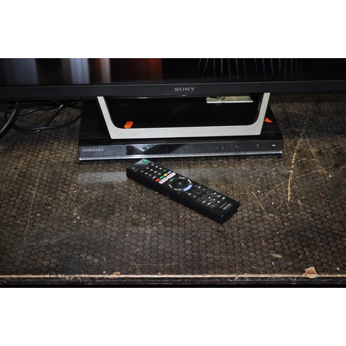 59 - A SONY KDL32WE613 32in SMART TV WITH REMOTE, and a Samsung DVD player (no remote) (both PAT pass and... 