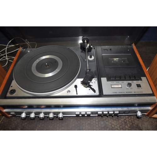 68 - A TANDBERG TR220 VINTAGE MUSIC CENTRE with a teak effect case, smoked plexi glass lid, a Dual 1225 t... 