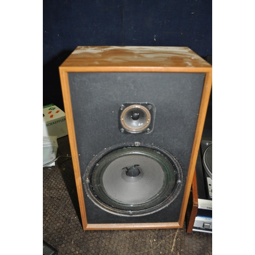 68 - A TANDBERG TR220 VINTAGE MUSIC CENTRE with a teak effect case, smoked plexi glass lid, a Dual 1225 t... 