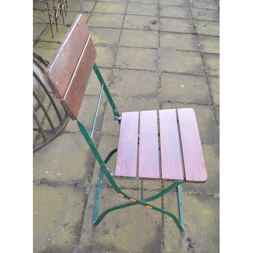 8 - A SET OF FOUR FOLDING GARDEN CHAIRS, with wrought iron frames and slatted wooden seats and backs, al... 